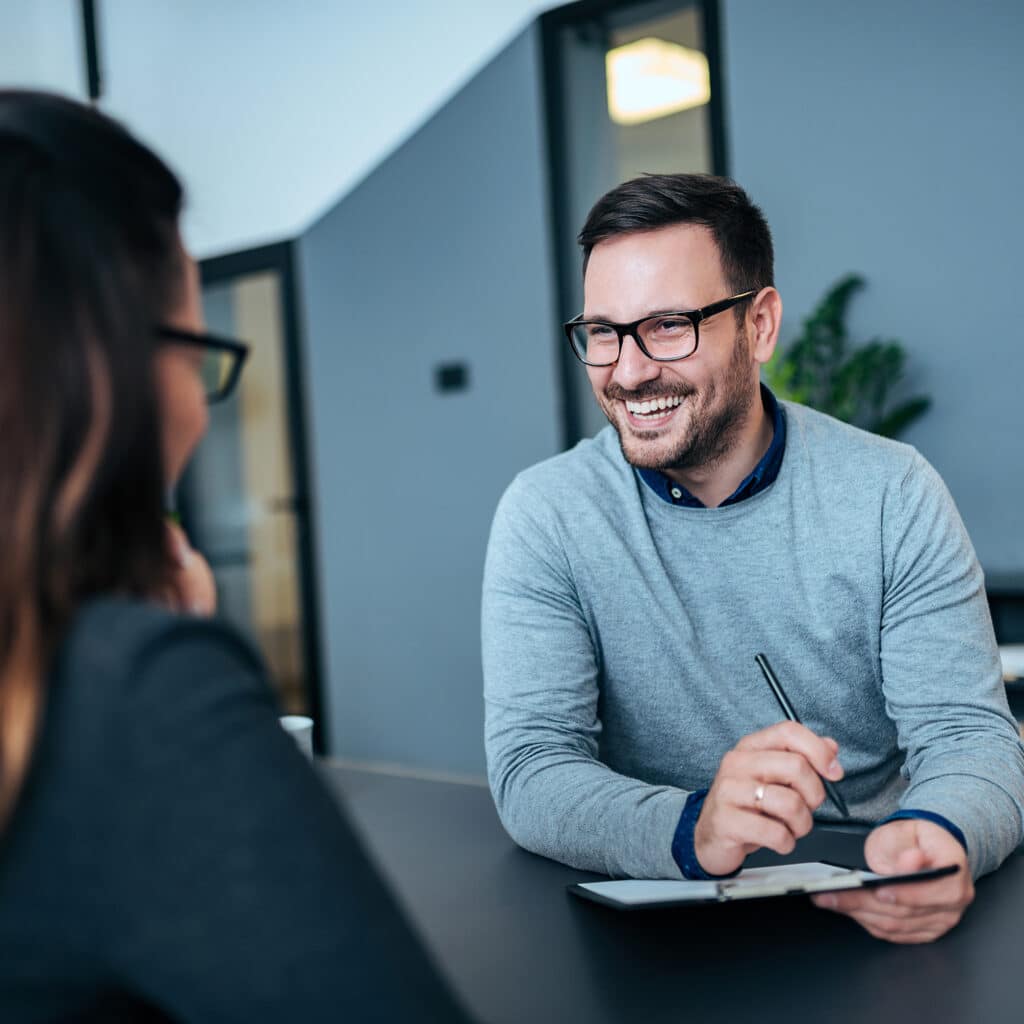 sales professional being trained by their coach